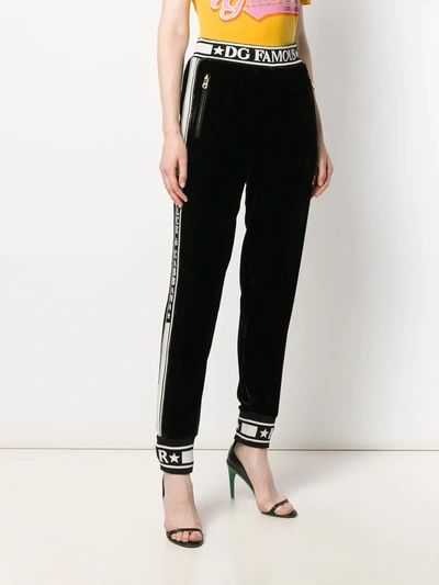Shop Dolce & Gabbana Piped Logo Track Pants In Black
