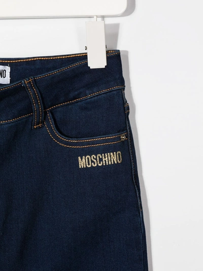 Shop Moschino Teddy Bear Jeans In Blue