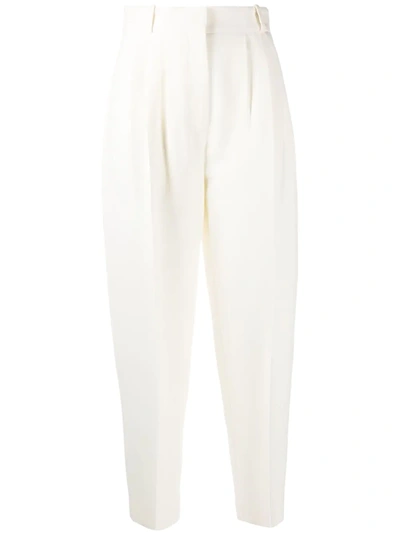 Shop Alexander Mcqueen Pleated Tapered Trousers In Neutrals