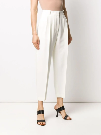 Shop Alexander Mcqueen Pleated Tapered Trousers In Neutrals