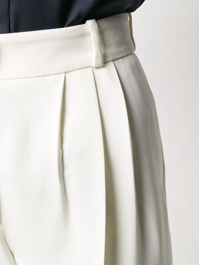 Shop Alexander Mcqueen Pleated Tapered Trousers In Neutrals