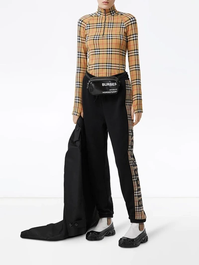 Shop Burberry Check Turtleneck Zip Top In Multicolour