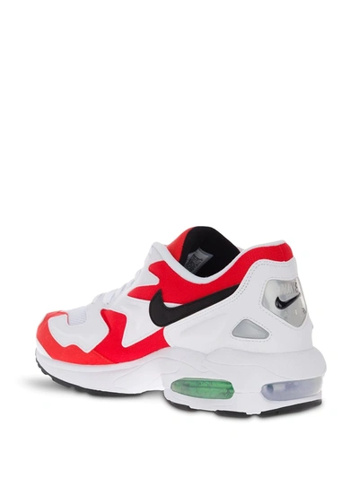 Shop Nike Air Max 2 Light Habanero Sneakers In White