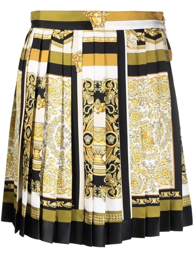 Shop Versace Printed Pleated Skirt In Gold ,black