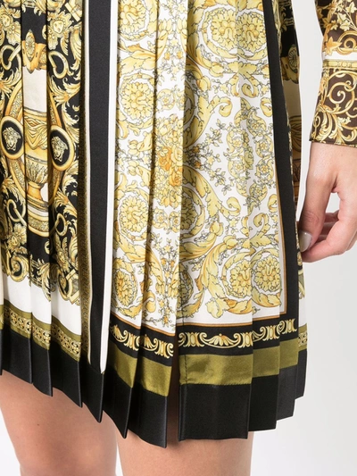 Shop Versace Printed Pleated Skirt In Gold ,black