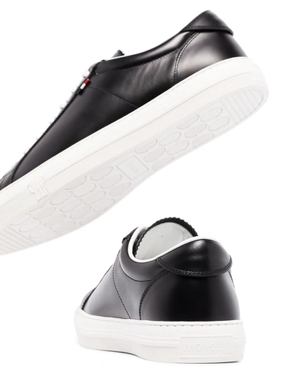 Shop Moncler New Monaco Leather Sneakers In Black