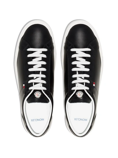 Shop Moncler New Monaco Leather Sneakers In Black