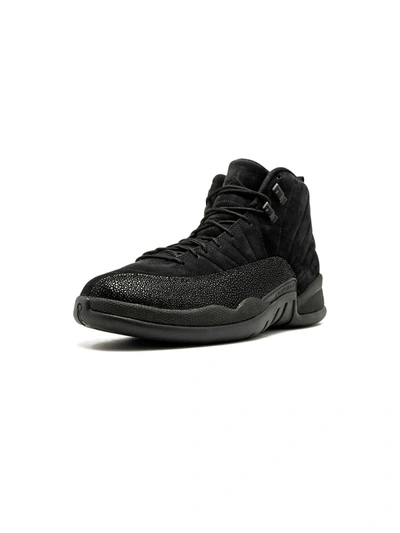 Shop Jordan Air  12 Retro Ovo Sneakers In Black