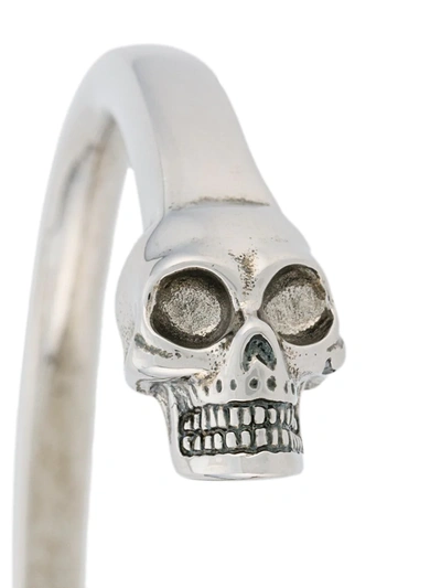 Shop Alexander Mcqueen Skulls Cuff In Metallic