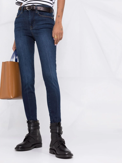 Shop Frame High-rise Skinny Jeans In Blau