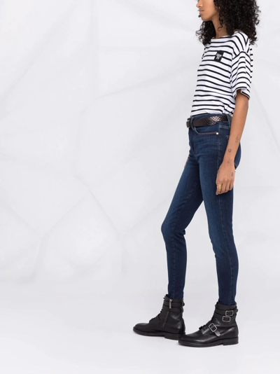 Shop Frame High-rise Skinny Jeans In Blau