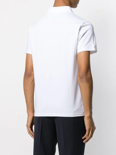 Shop Filippa K Fitted Buttonless Polo Shirt In White