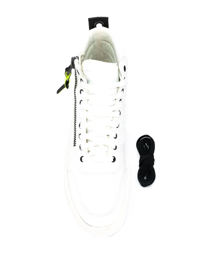 Shop Diesel Side Zip Sneakers In White