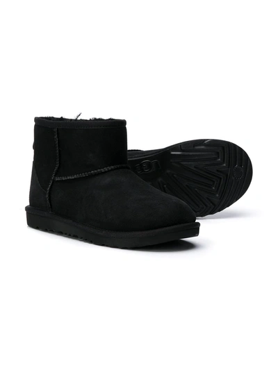 Shop Ugg Teen Classic Mini Ii Boots In Black