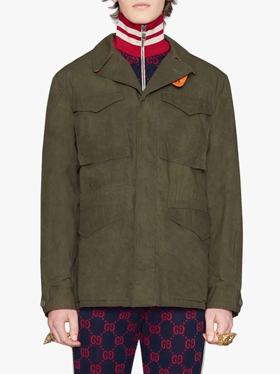 Coated parka with Gucci logo