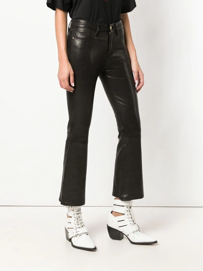 Shop Frame Kick Flare Trousers In Black