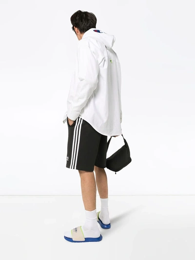 Shop Adidas Originals Three-stripe Track Trousers In Black