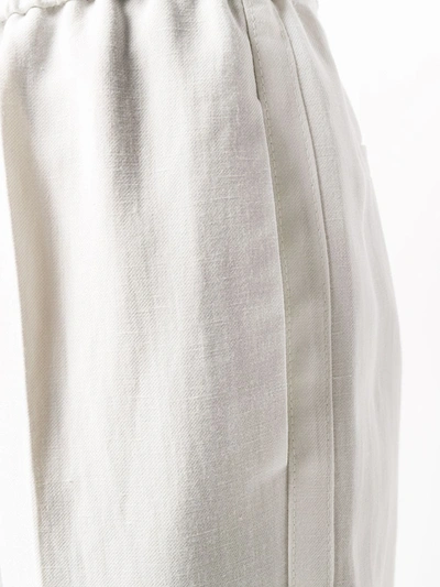 Shop Brunello Cucinelli Cropped Stripe Detail Trousers In White