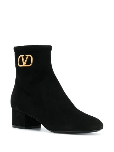 Shop Valentino Vlogo 50mm Ankle Boots In Black