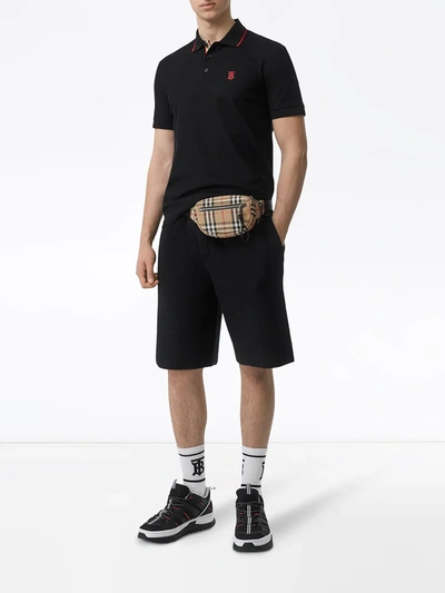 Shop Burberry Icon Stripe Placket Piqué Polo Shirt In Black