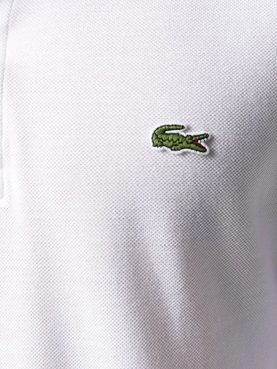 Shop Lacoste Logo Patch Polo Shirt In White