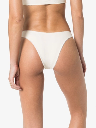 Shop Juillet Dani Lace Trim Bikini Bottoms In White