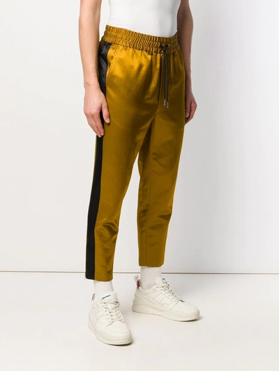 Shop Ami Alexandre Mattiussi Track Pants With Contrasted Side Bands In Gold