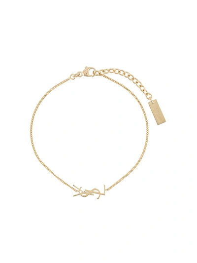Shop Saint Laurent Interlocking Monogram Bracelet In Gold