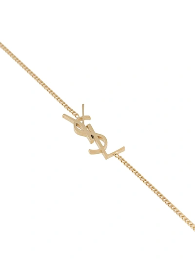 Shop Saint Laurent Interlocking Monogram Bracelet In Gold