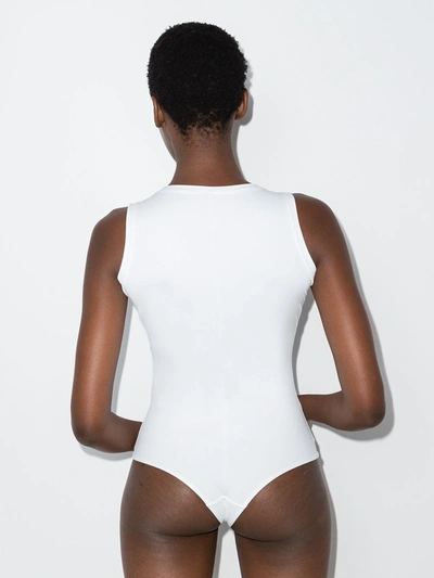 Shop Spanx Suit Yourself V-neck Bodysuit In White