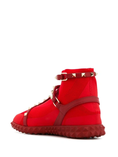 Shop Valentino Free Rockstud Bodytech Sneakers In Red
