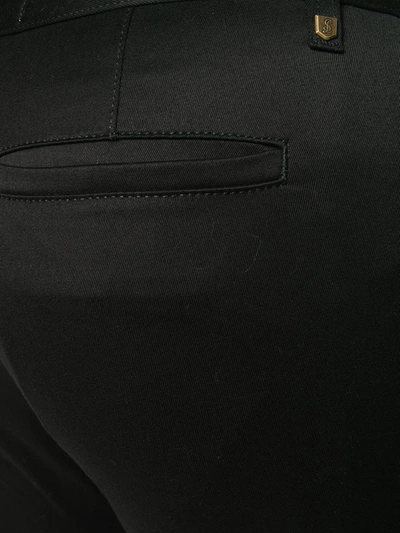 Shop Saint Laurent Skinny Fit Trousers In Black