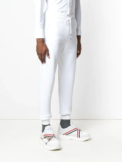 Shop Thom Browne Signature Stripe Track Trousers In White