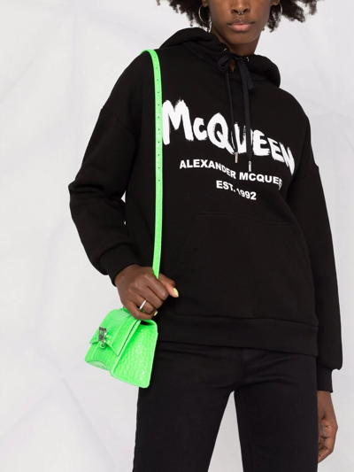Shop Alexander Mcqueen Logo-print Cotton Hoodie In Schwarz