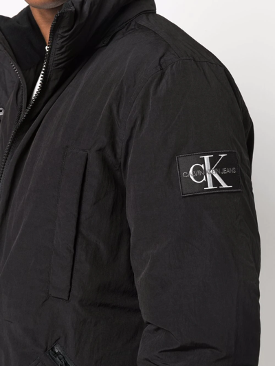 Shop Calvin Klein Jeans Est.1978 Hooded Logo-patch Padded Jacket In Schwarz