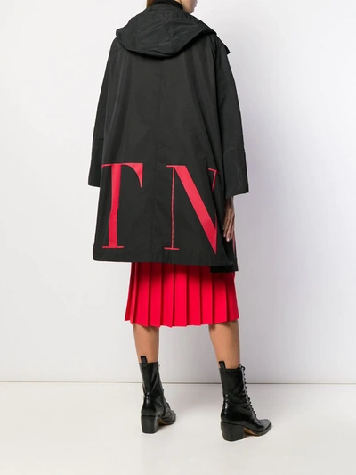 Shop Valentino Vltn Logo Print Parka Coat In Black