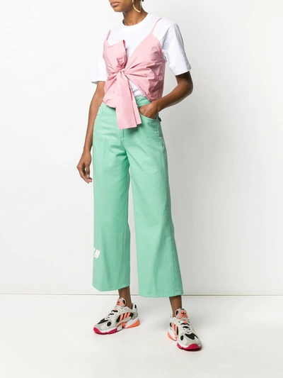 Shop Msgm Wide Leg Jeans In Green