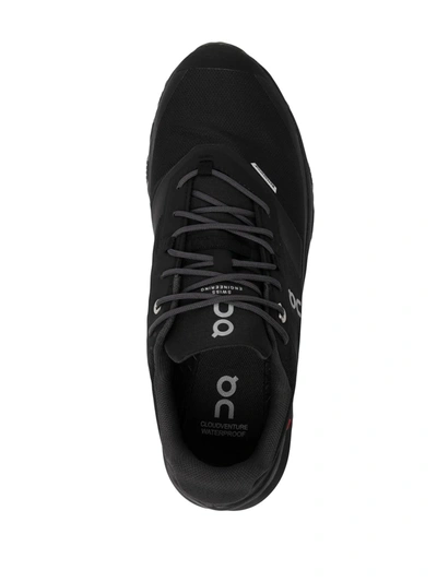Shop On Running Cloudventure Low Top Sneakers In Black