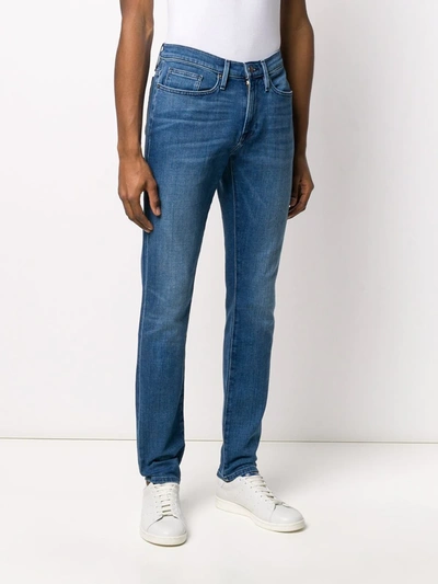 Shop Frame Slim Fit Jeans In Blue