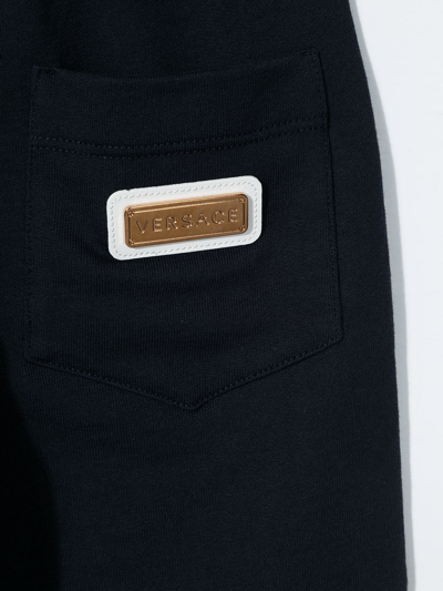 Shop Versace Logo-patch Greca-trim Joggers In Blue