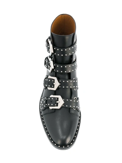 Shop Givenchy Studded Buckled Boots In Black