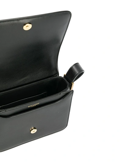 Shop Saint Laurent Le 61 Saddle Shoulder Bag In Black