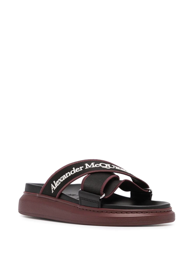 Shop Alexander Mcqueen Logo-print Slip-on Sandals In Black