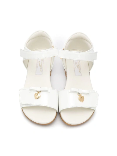 Shop Dolce & Gabbana Flat Sandals With Bow In White