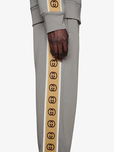 Shop Gucci Interlocking G Taped Track Pants In Grey