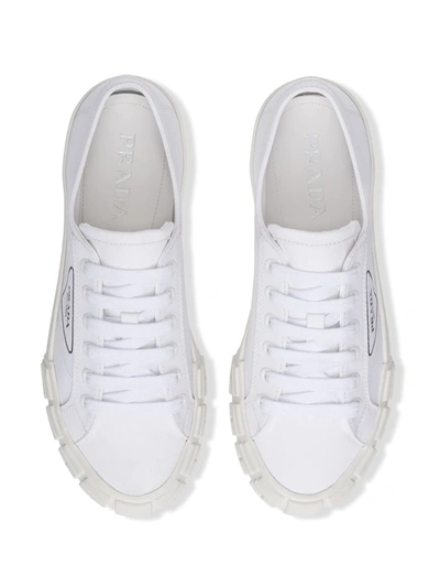 Shop Prada Wheel Low-top Sneakers In White