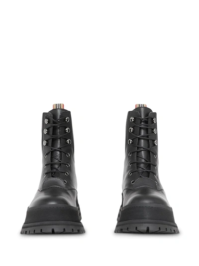 Shop Burberry Iconic Stripe Detail Chunk Boots In Black