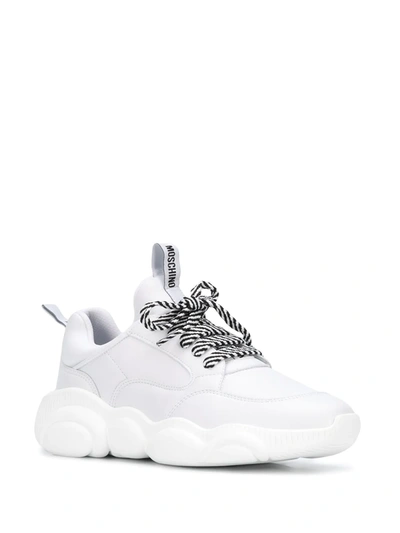 Shop Moschino Teddy Run Lace-up Sneakers In White