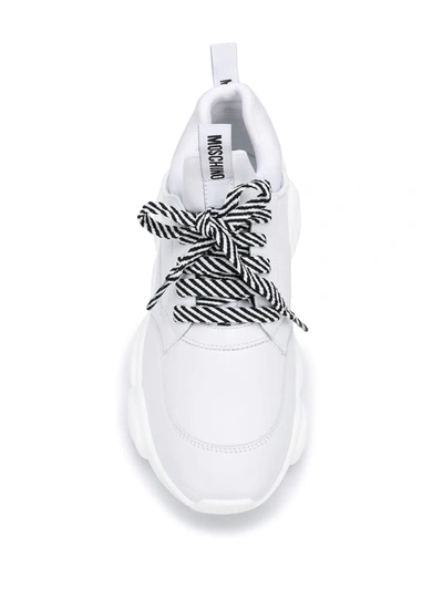 Shop Moschino Teddy Run Lace-up Sneakers In White