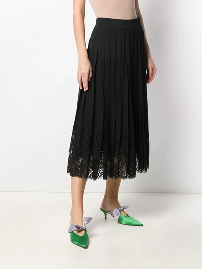 Shop Dolce & Gabbana Flared Lace-hem Skirt In Black